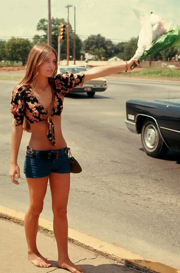 hippie girl selling flowers